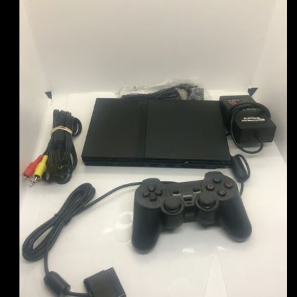 PlayStation 2 Slim SCPH-70006Plays Both USA and Japanese Game Disc